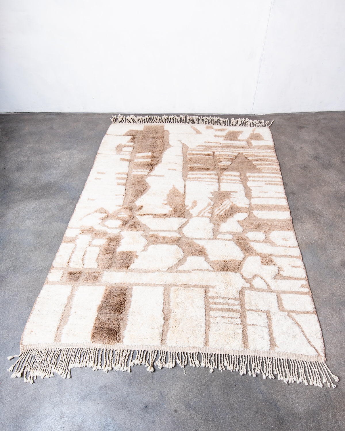 Modern, designer, handcrafted 100% sheep’s wool Berber rug from Morocco. Beni M’rirt carpet with beautiful colours and patterns and fluffy wool texture.
